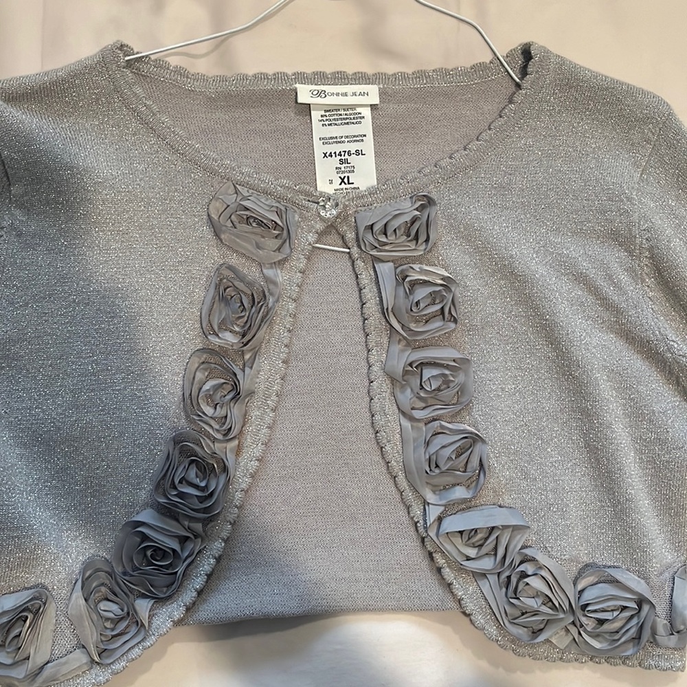 Beautiful Bonnie Jean silver sweater size children’s XL.